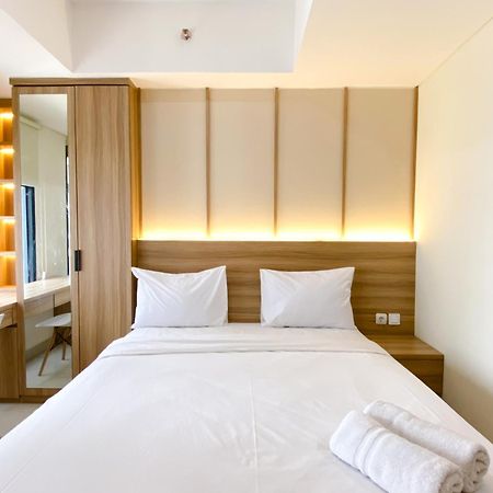 Homey And Warm Studio Room Pollux Chadstone Apartment By Travelio Cikarang Esterno foto