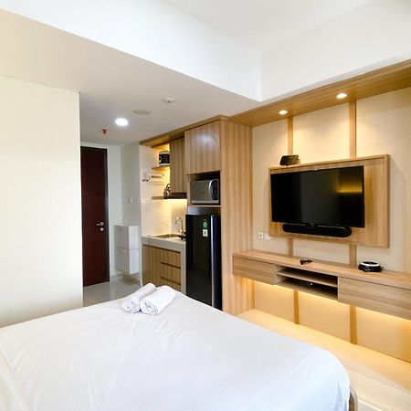 Homey And Warm Studio Room Pollux Chadstone Apartment By Travelio Cikarang Esterno foto